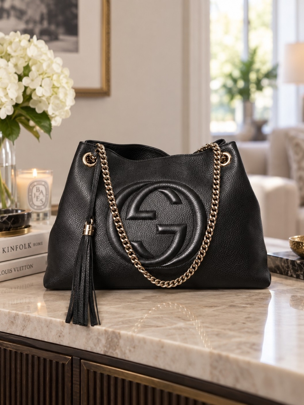 Gucci Black Pebbled Leather Shoulder Bag with Gold Chain and Tassel Accent